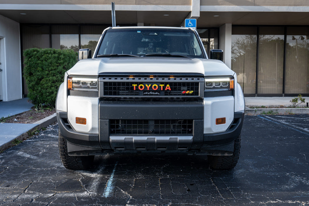 StickerFab Tri Color Topographic Grille Emblem for Tacoma (2016-2023)