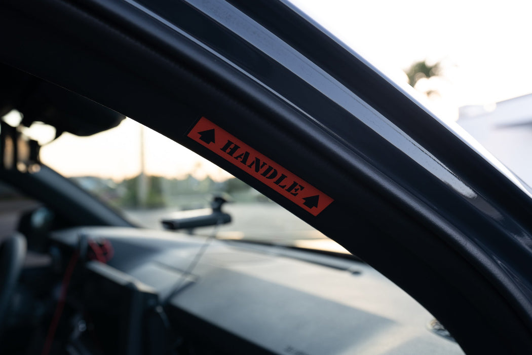StickerFab Passenger Side Grab Handle Warning Label for Tacoma (2024-Current)